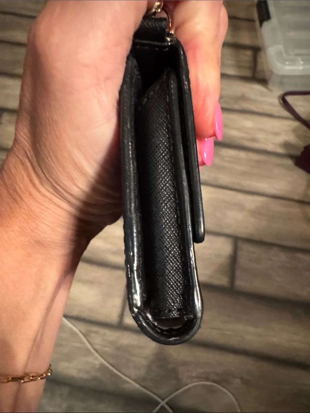 kate spade black saffiano leather wallet with gold logo